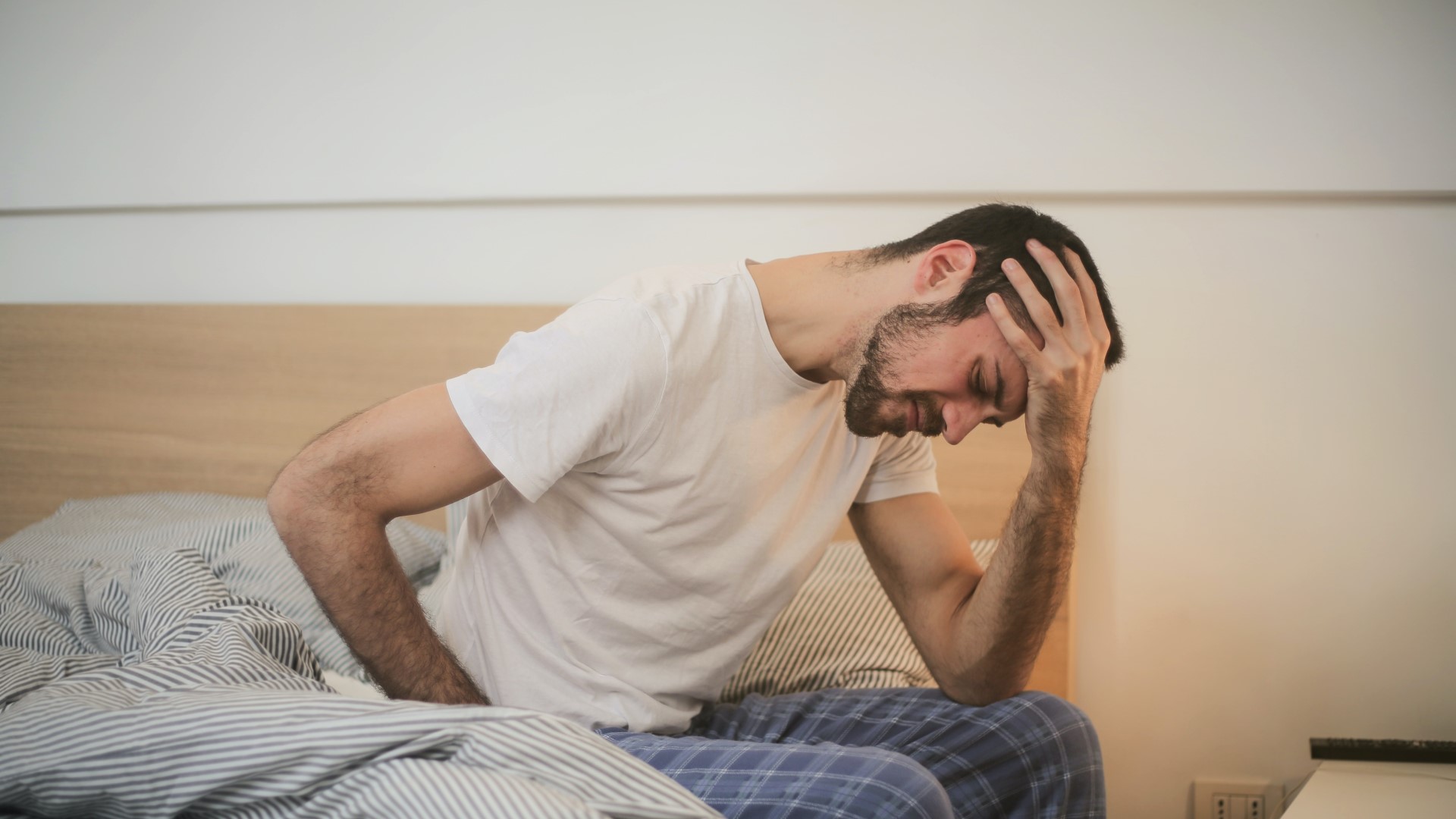 Man waking up needing urgent care